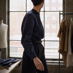 Kestrel pleated-bib evening shirt — Tailored Shirts by CROWN TAILORING. worn by a model.