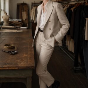 Clerkenwell double-breasted suit jacket — Suit Jackets by CROWN TAILORING. worn by a model.