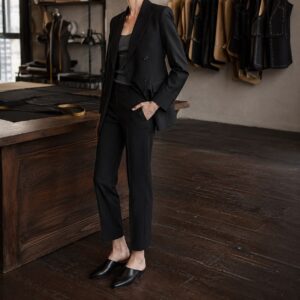 Clerkenwell double-breasted suit jacket — Suit Jackets by CROWN TAILORING. worn by a model.