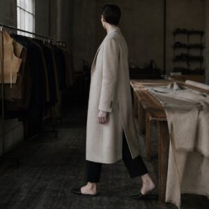 Kestrel long-line tailored coat jacket — Suit Jackets by CROWN TAILORING. worn by a model.
