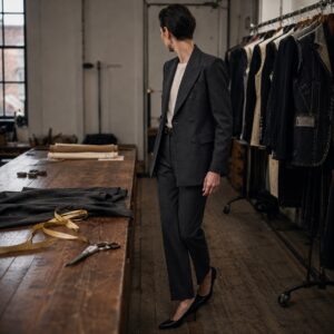 Dartmoor double-breasted suit jacket — Suit Jackets by CROWN TAILORING. worn by a model.