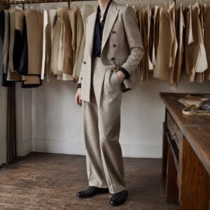 Cotswold double-breasted suit jacket — Suit Jackets by CROWN TAILORING. worn by a model.