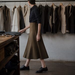 Clerkenwell A-line midi skirt — Tailored Skirts by CROWN TAILORING. worn by a model.