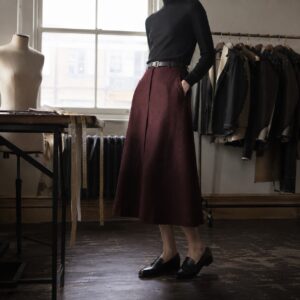 Pimlico A-line midi skirt — Tailored Skirts by CROWN TAILORING. worn by a model.