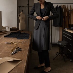 Blackthorn box-pleated wrap skirt — Tailored Skirts by CROWN TAILORING. worn by a model.