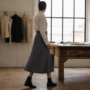 Larkspur A-line midi skirt — Tailored Skirts by CROWN TAILORING. worn by a model.