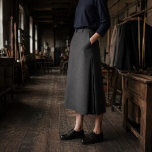 Wren A-line midi skirt — Tailored Skirts by CROWN TAILORING. worn by a model.