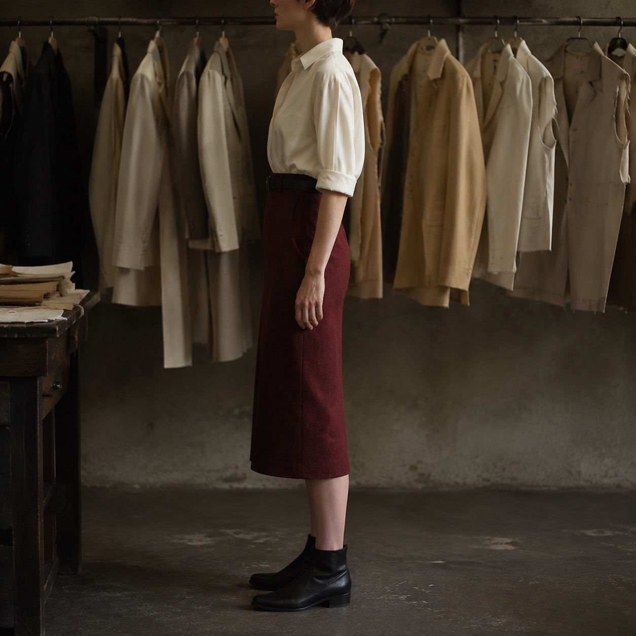 Bracken pencil skirt — Tailored Skirts by CROWN TAILORING. worn by a model, side view.