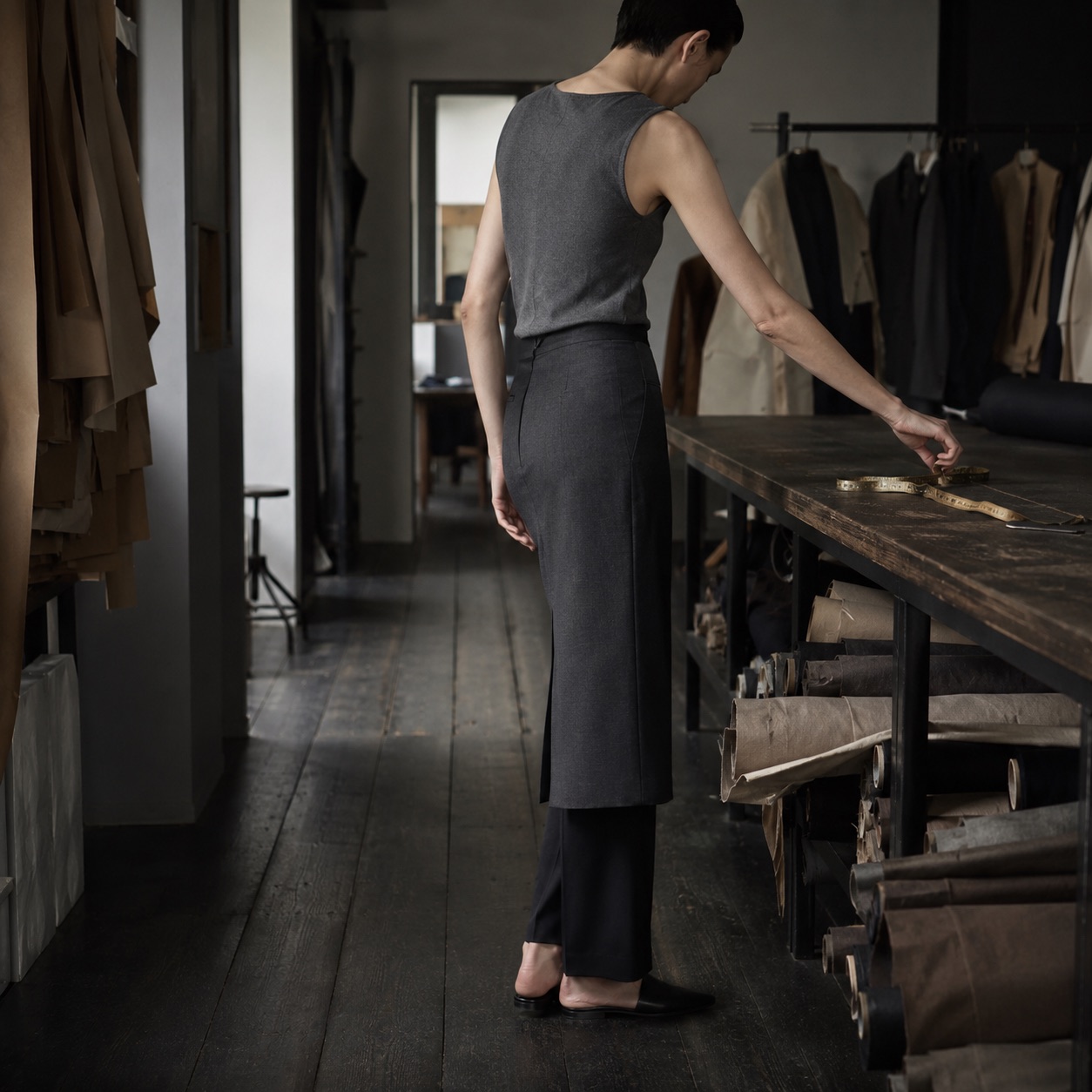 Thornbury pencil skirt — Tailored Skirts by CROWN TAILORING. worn by a model, side view.