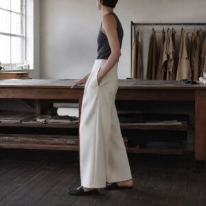 Fitzrovia wide-leg tailored trousers — Tailored Trousers by CROWN TAILORING. worn by a model.