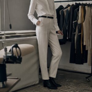 Clerkenwell cigarette-leg tailored trousers — Tailored Trousers by CROWN TAILORING. worn by a model.