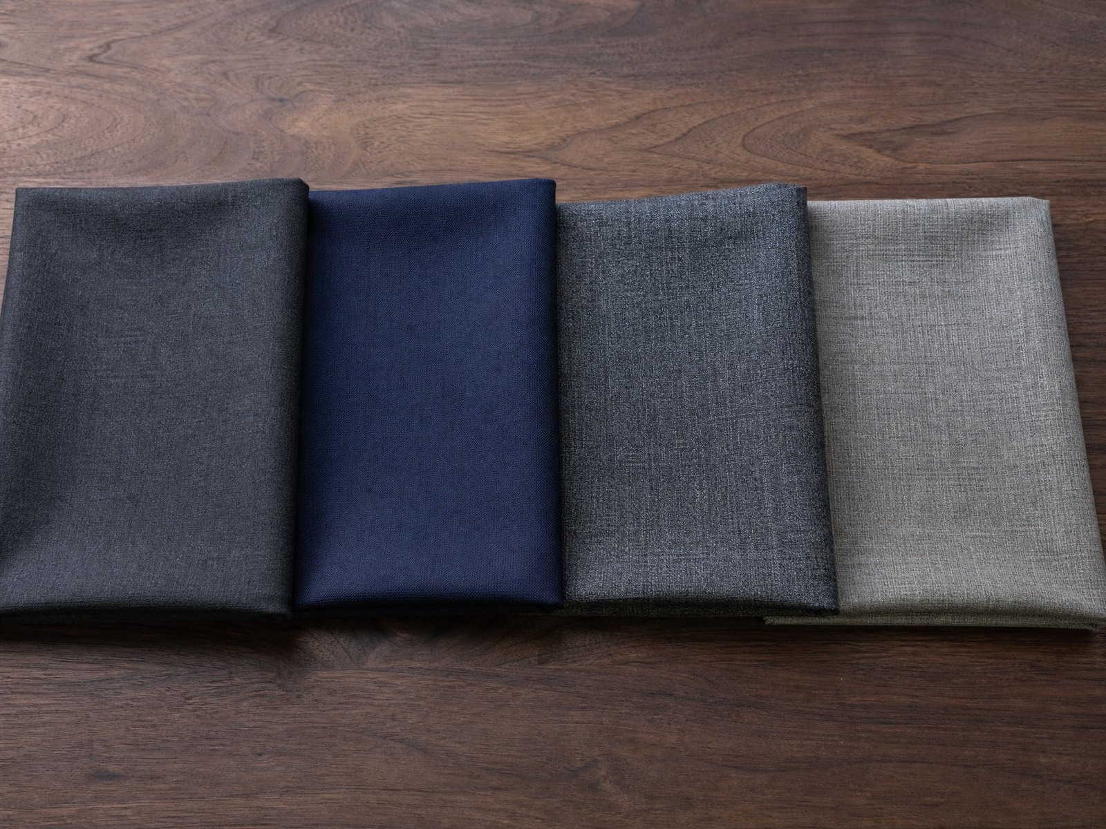 Four cones of yarn in merino, lambswool, cotton and bamboo viscose